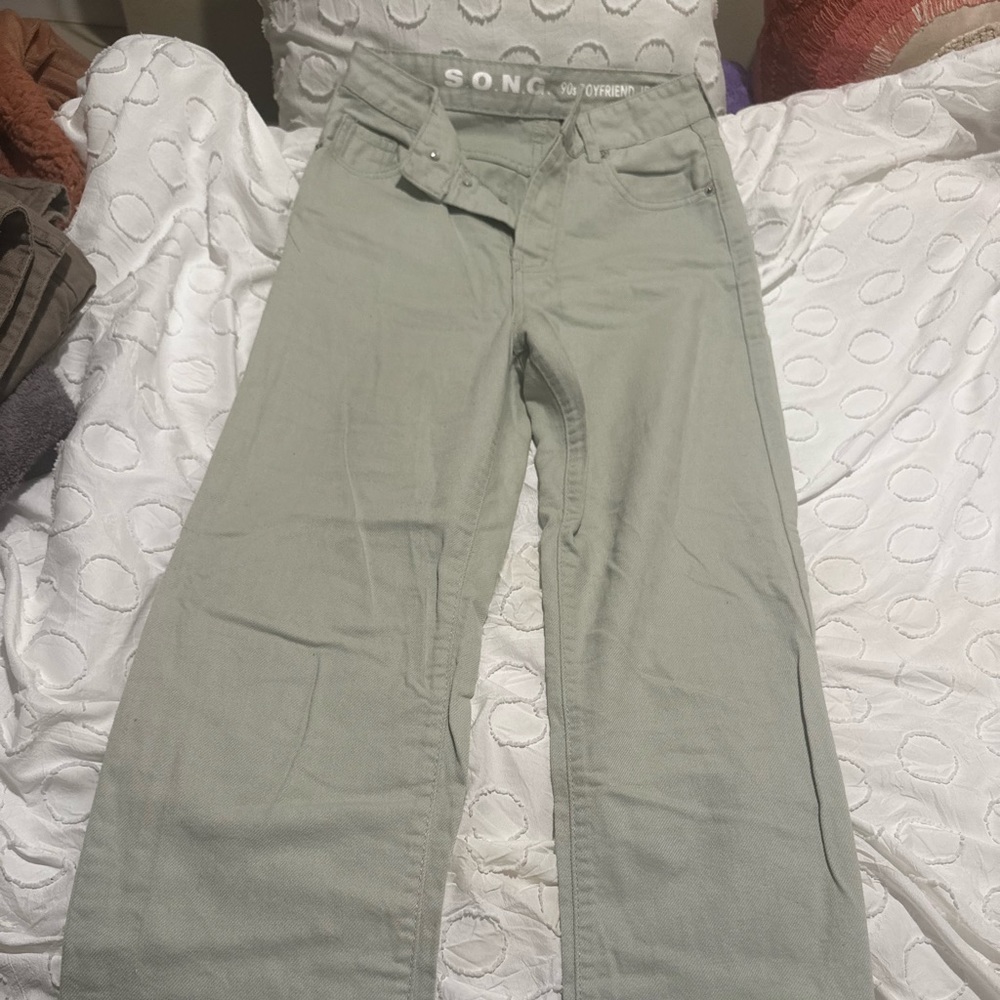 light green boyfriend jeans , straight leg baggy fit